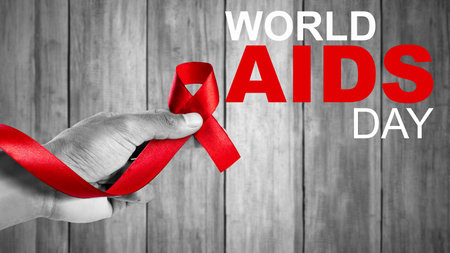 Human hand showing red ribbon awareness. World Aids Day conceptの写真素材