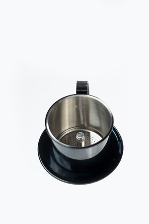 Vietnam drip coffee maker isolated over a white backgroundの写真素材