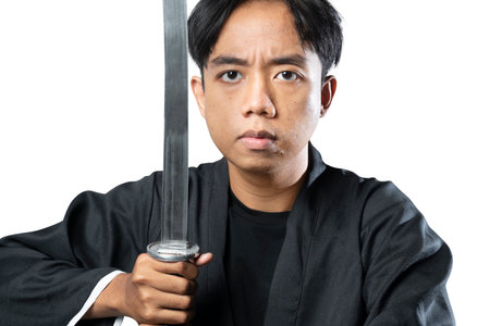 Samurai warrior holding the sword isolated over white background