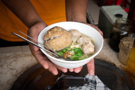 Meatball soup (Bakso) in the bowl is ready to serve. Traditional Indonesia food