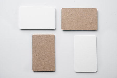 Stack of business cards on a white background. Empty business card for copy space