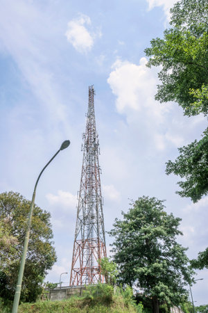Telecommunication tower with a blue sky background