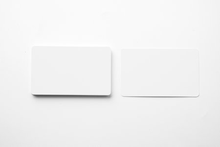Stack of business cards on a white background. Empty business card for copy spaceの写真素材