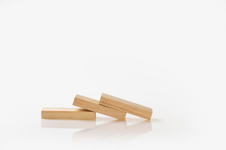 Stack of wooden blocks isolated over a white backgroundの写真素材