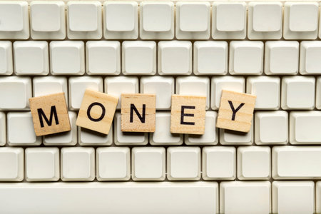 Closeup view row of wooden cubes with MONEY letters. The financial and economic conceptの写真素材