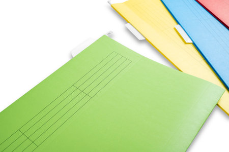 Stack of colorful document files isolated over a white backgroundの写真素材