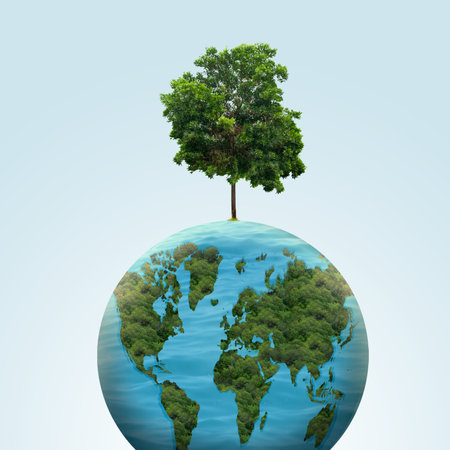 Globe with a growing tree on a blue sky background. Earth day conceptの写真素材