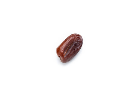 Image of tasty dried dates fruits isolated on white background. Clipping path. Vegetarian and...