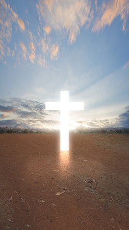 Closeup view of a Christian cross with a blue sky background. Christian conceptの写真素材