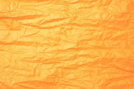 Closeup view of colored crumpled paper for texture backgroundの写真素材