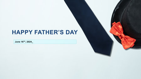 Black hat and red bow tie with a Happy Father's Day message. Fathers day conceptの写真素材