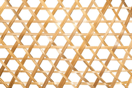 Closeup view of handmade woven bamboo isolated over a white backgroundの写真素材
