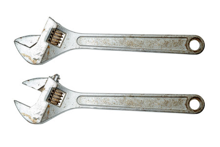 Closeup view of adjustable wrench mechanic tools isolated over a white background