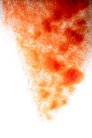 Closeup view of red glitter on a white backgroundの写真素材