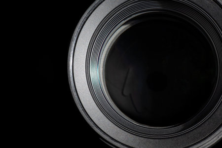 Closeup view of camera lens aperture on a black background. Photography and film conceptの写真素材