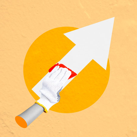A human hand in a protective glove holding a scraper paint with a raising arrow symbol on a colored background. Collage artの写真素材