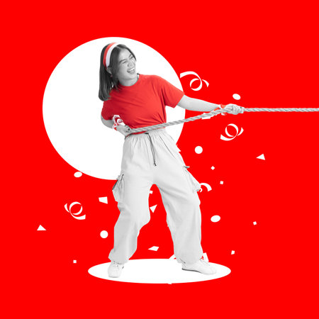 Portrait of an Indonesian woman in a tug of war contest to celebrate Indonesian Independence Day