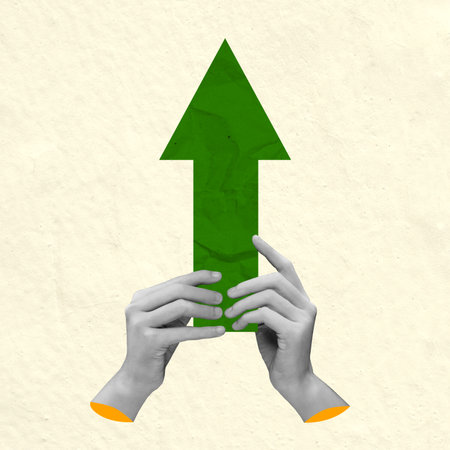 A human hand holding a green arrow line on a colored background. Collage artの写真素材