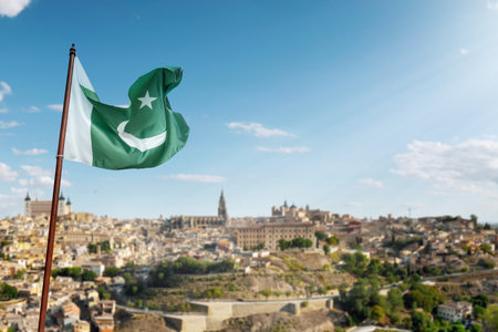 Pole with Pakistan flag waving in the air. Pakistan Independence Day conceptの写真素材