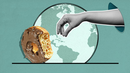 A hand is reaching for a mini donut with chocolate frosting on it. The mini donut is on a plate and the plate is on a table. The image has a playful and lighthearted moodの写真素材