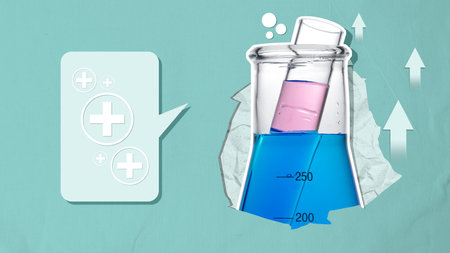 A blue liquid in a beaker is poured into a glass tube on a colored background. Science conceptの写真素材