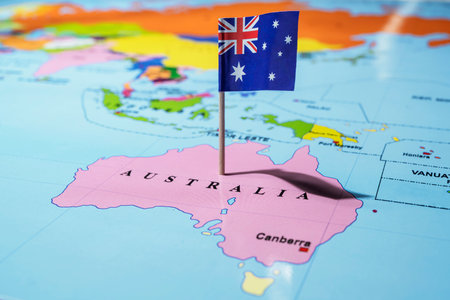 A map of Australia with an Australian flag on it. The flag is blue with white stars. Travel and government conceptの写真素材
