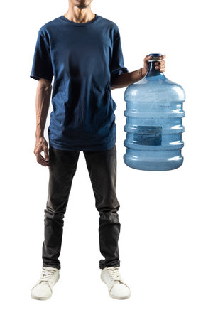 A man is holding a water gallon in his hands isolated on a white backgroundの写真素材