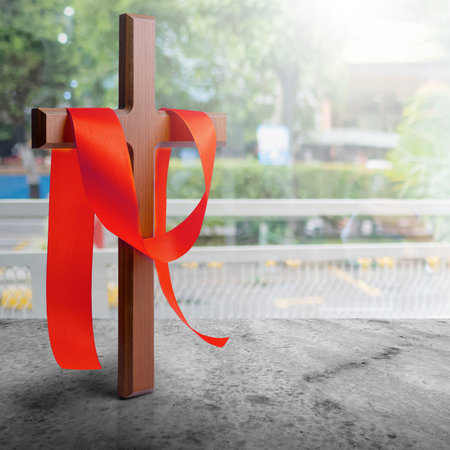 Religion christianity cross and red ribbon. Symbol of faith and worship in God. Religious christian service, holiday or conceptの写真素材