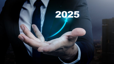 Businessman hand showing an increased arrow of 2025. Planning, opportunity, challenge, and business...