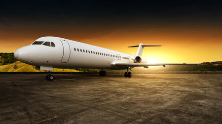 Commercial airplane on the runway with a sunset scene background. Travel by airplane conceptの写真素材