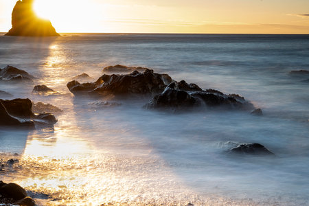 View of Black Sand Beach of Reynisfjara and Reynisdrangar Sea stacks in the Vik. Iceland. Nature,...