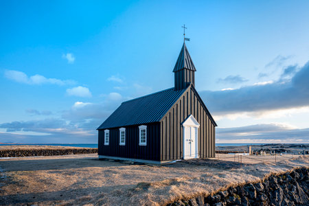 BÃºÃ°akirkja, The Black Church of Budir is a small wooden church located on the south side of SnÃ¦fellsnes Peninsula, Iceland. Religion, architecture, nature, travel, winter background or wallpaperの写真素材