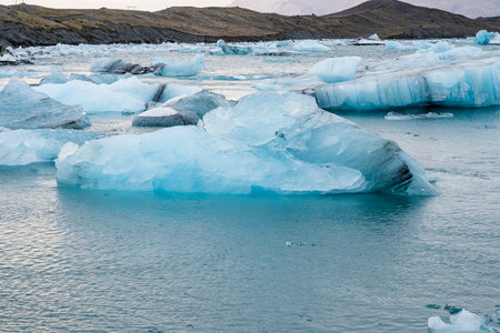 View of the melting glacier on Jokulsarlon or JÃ¶kulsÃ¡rlÃ³n Glacier Lagoon, Iceland. Nature,...