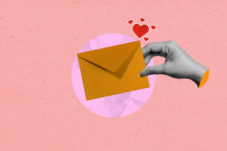 A human hand holding an envelope with red hearts on a colored background. Mockup, copy space, or...