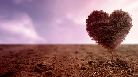 View of a tree with a heart shape in the dramatic sky background. Copy space. Decoration for Love or Valentine Day backgroundの写真素材