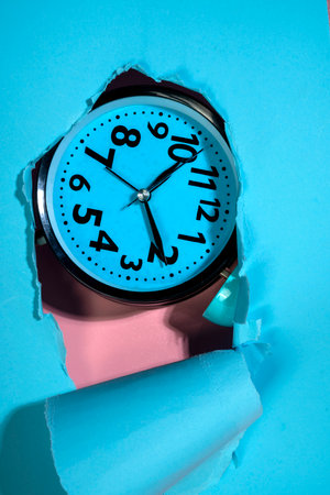 Clock face on ripped paper. Mockup or Copy space. Concept of time management, reminder or planning,...