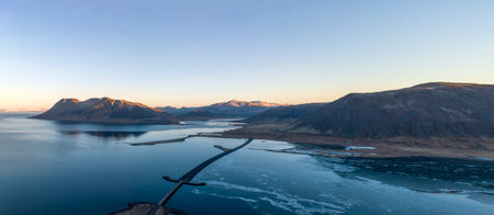Aerial view of landscapes with a mountain range on KolgrafarfjÃ¶rdur or Kolgrafarfjordur viewpoint, Iceland. Taken by drone. Nature, travel, winter background, or wallpaperの写真素材