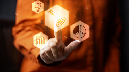 Business person touching virtual icons interface of target goal. Data management system. Smart corporate and technology innovation on a virtual screen. Concept of business, finance, and global networkの写真素材