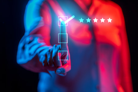Businessperson touching a checkbox with five stars. Technology innovation on a virtual screen. Concept of Customer review or satisfaction, and service experience ratingの写真素材