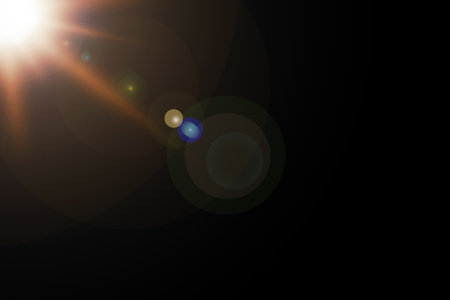 Sunrays or sunlight effect, lens flare, light leaks, overlays, or flare light on a black background. Glow, bright, and shineの写真素材