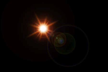 Sunrays or sunlight effect, lens flare, light leaks, overlays, or flare light on a black background. Glow, bright, and shineの写真素材