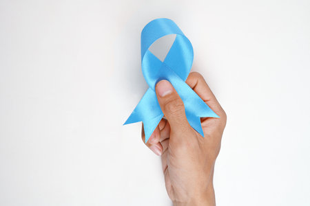 Human hand showing the blue ribbon awareness. Concept of world diabetes day. Healthy lifestyleの写真素材