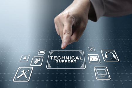 Businesswoman touching the icon of technical support. Technology innovation on a virtual screen. Concept of technical support or customer serviceの写真素材