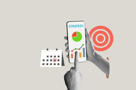 Human hand holding a cellphone with a strategy graph and chart on the screen. Concept of strategy planning. Collage artの写真素材