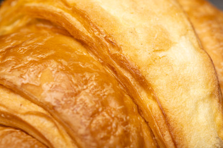 Closeup view of croissant texture. Food backgroundの写真素材