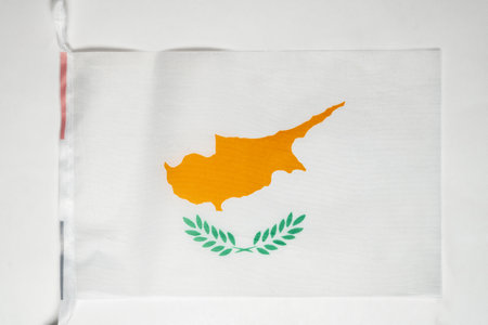 Closeup view of the Cyprus national flag isolated over a white background. Concept of government and nationalityの写真素材