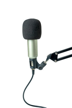 Studio microphone for podcasting or streaming on a boom arm with a white backgroundの写真素材