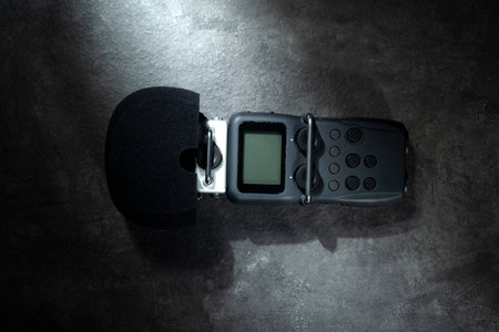 Handy recorder device on a black background. Top viewの写真素材