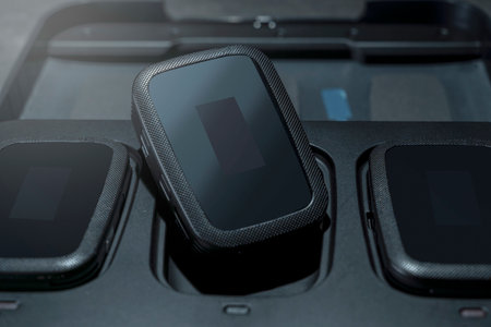 Clip on wireless microphone for interview or podcast equipment in the box on a black background