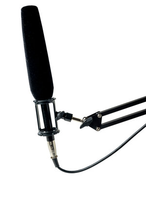 Studio microphone for podcasting or streaming on a boom arm with a white backgroundの写真素材